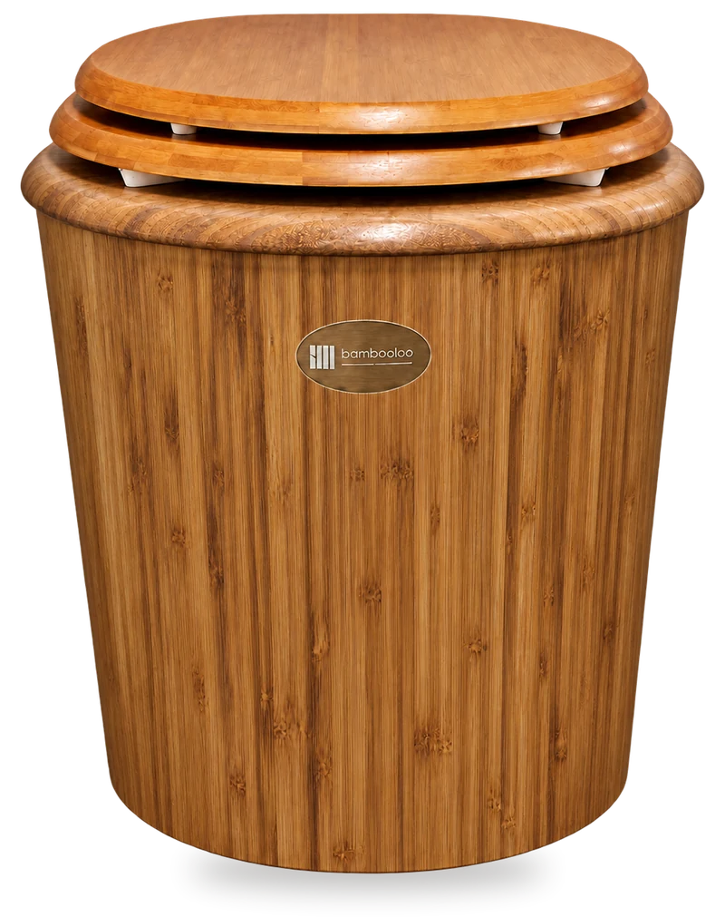 A Bambooloo Carbon seen from the front: the same tapered body in heat-treated caramel bamboo, close in tone to its seat and lid, with the oval bambooloo badge